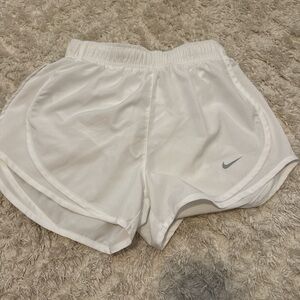 White Nike shorts